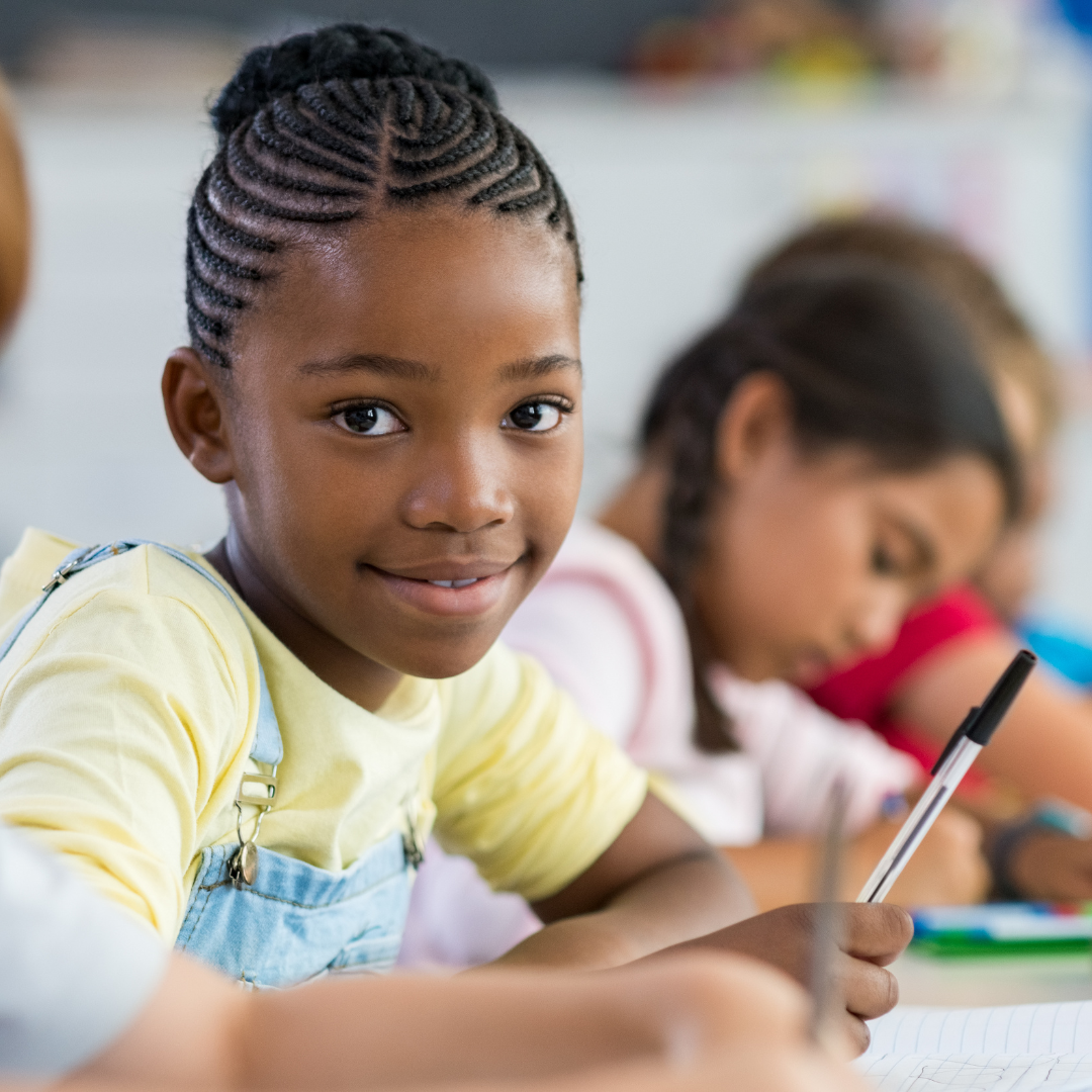 Girl writing in notebook